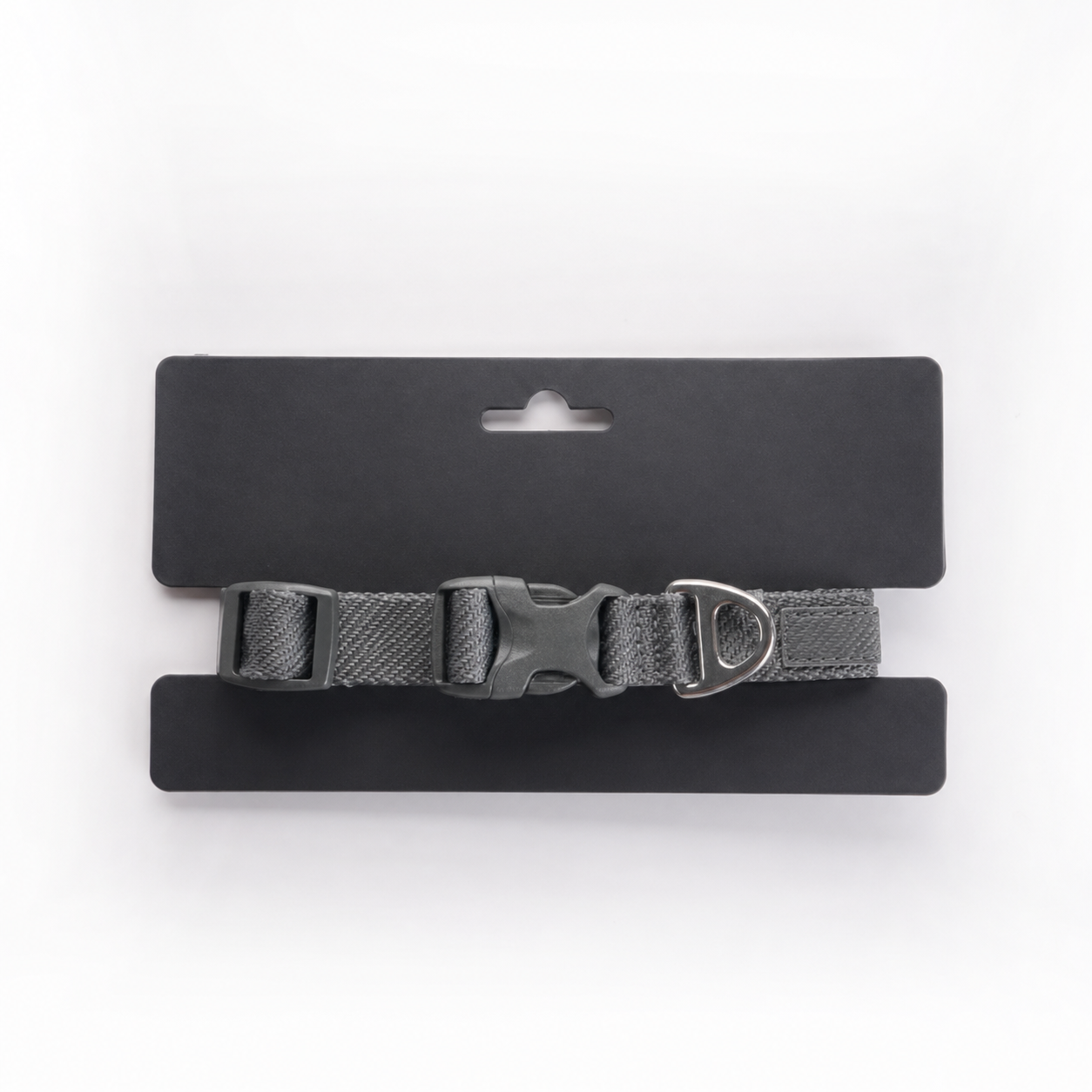 Gray adjustable dog collar with quick-release buckle, D-ring, and label patch