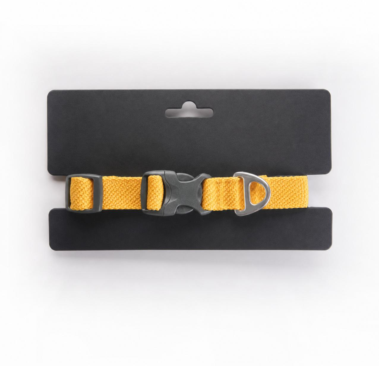 Yellow adjustable dog collar with quick-release buckle and metal D-ring
